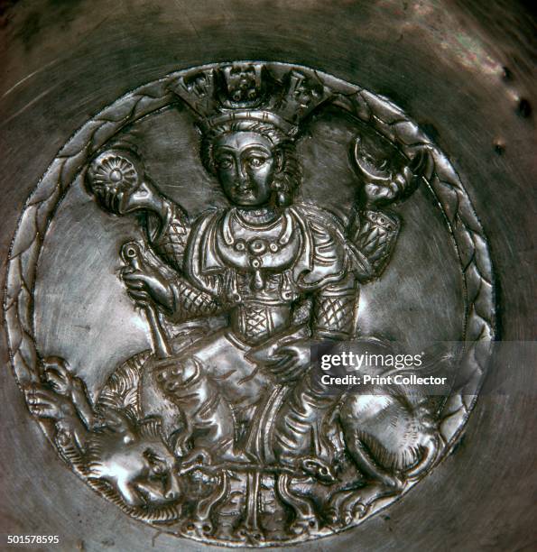 Sassanian silver dish showing a goddess, possibly Ishtar, seated on a lion. From the British Museum's collection.