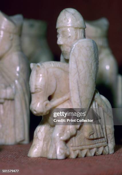 The Lewis Chessmen, , c1150-c1200. A Knight piece from a collection of ninety-three found at Uig on the Isle of Lewis, Outer Hebrides, Scotland....