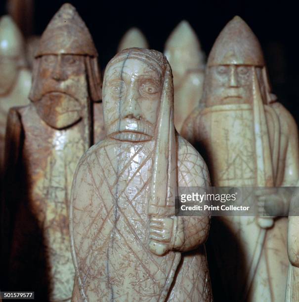 The Lewis Chessmen, , c1150-c1200. Wild-eyed berserkers biting their shields from a collection of ninety-three pieces found at Uig on the Isle of...