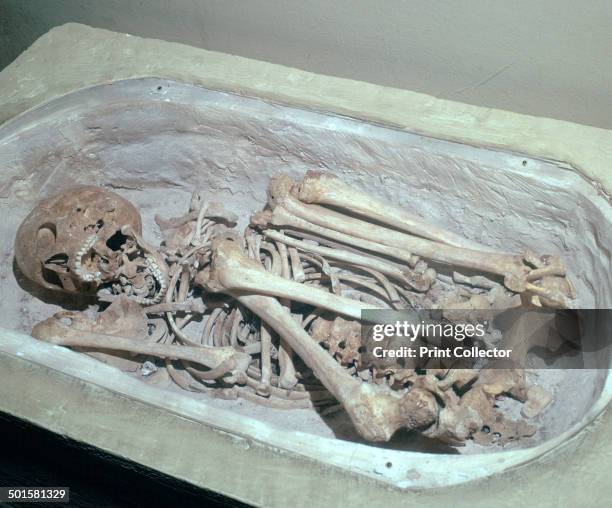 Late Minoan burial in a 'Bath Tub Sarcophagus', in the Archaeological Museum in Heracleion, 11th century BC.