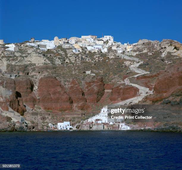 The town of Oia on Santorini above the volcanic cliffs, and the volcanic path to the anchorage