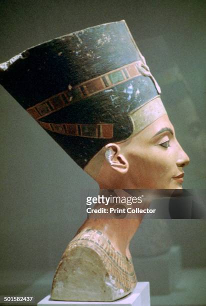 Limestone head of Queen Nefertiti, wife of Akhenaten, from El Amarna, Egypt. Now in the Egyptian Museum, Berlin.