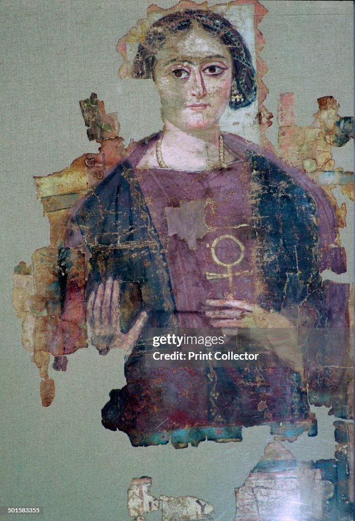 Coptic painting of a man holding an ankh-cross.