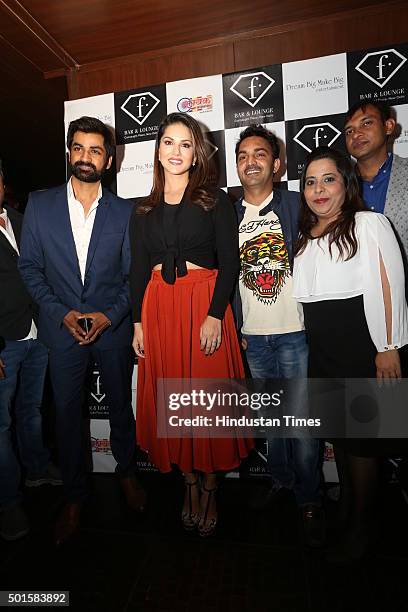 Owners of F Bar and Lounge Ajay and Sunita Sharma with Bollywood actress Sunny Leone and actor Manish Goel at an event of F Bar and Lounge, Connaught...