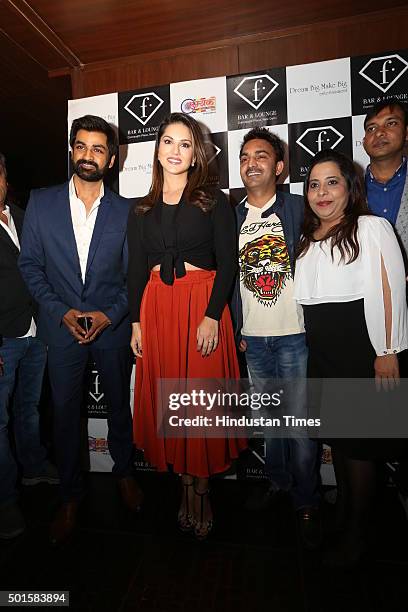 Owners of F Bar and Lounge Ajay and Sunita Sharma with Bollywood actress Sunny Leone and actor Manish Goel at an event of F Bar and Lounge, Connaught...