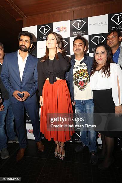 Owners of F Bar and Lounge Ajay and Sunita Sharma with Bollywood actress Sunny Leone and actor Manish Goel at an event of F Bar and Lounge, Connaught...