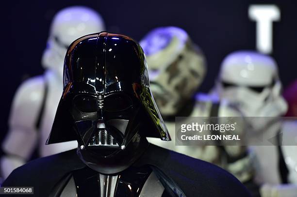 Darth Vader accompanied by storm troopers attends the European Premiere of "Star Wars: The Force Awakens" in central London on December 16, 2015....