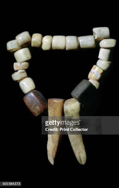 Necklace from a Neolithic Village in Scara Brae, Orkney, made of bone and stone. From the Tankernges House Museum on Orkney.
