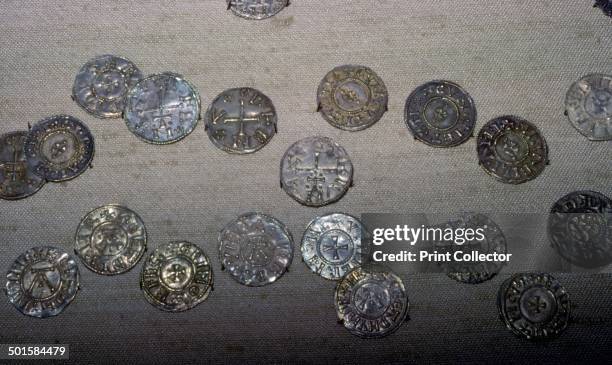 Coins from the Cuerdale Hoard, mostly English with some from the continent, including Hedeby and Kueic coins. Found near Rebbes, Lancashire in 1840.