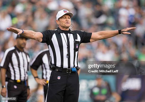 Referee Ed Hochuli calls a foul in the game between the Buffalo Bills and Philadelphia Eagles on December 13, 2015 at the Lincoln Financial Field in...