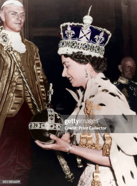 Queen Elizabeth II returning to Buckingham Palace after her Coronation at Westminster Abbey, London, June 1953. .