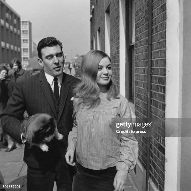 English gangster Reggie Kray with his fiance, Frances Shea , London April 1965. Kray is returning home after being found not guilty on menaces...