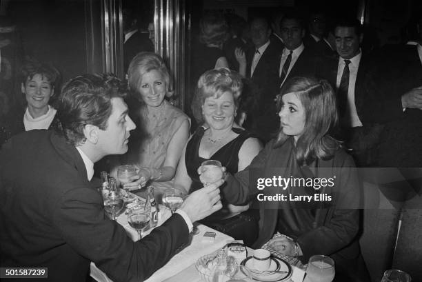 British actor Edmund Purdom with Frances Shea , wife of English gangster Reggie Kray, at the El Morocco, a nightclub owned by the Kray Twins, in...