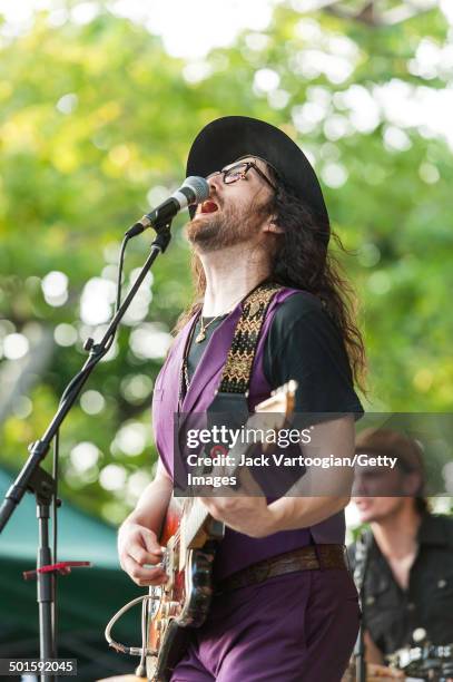 American musician Sean Lennon plays guitar with his band The Ghost of a Saber Tooth Tiger at a benefit concert for and at Central Park SummerStage,...