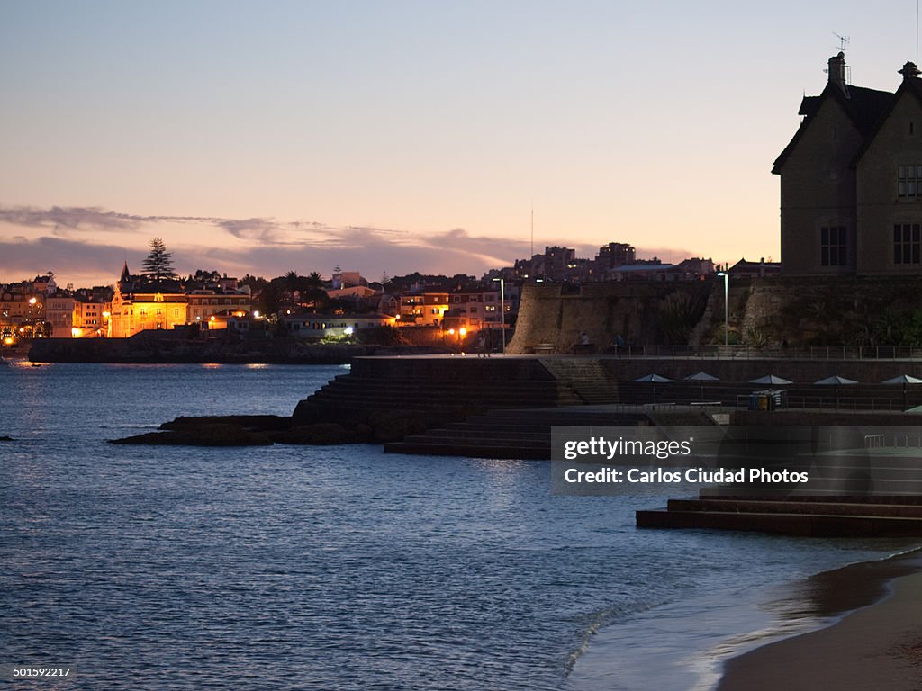 Cascais promenade and beach at sunset