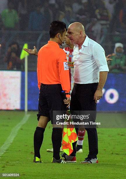 Antonio Lopez Habas, coach of Atletico de Kolkata, gets into argument with a match official after his team failed to make it to the finals of ISL...