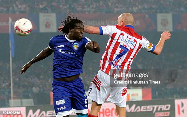 Iain Hume of Atletico de Kolkata vying for the ball with Chennaiyin FC player Bernard Mendy during their ISL semi-final, second leg match, at Yuva...