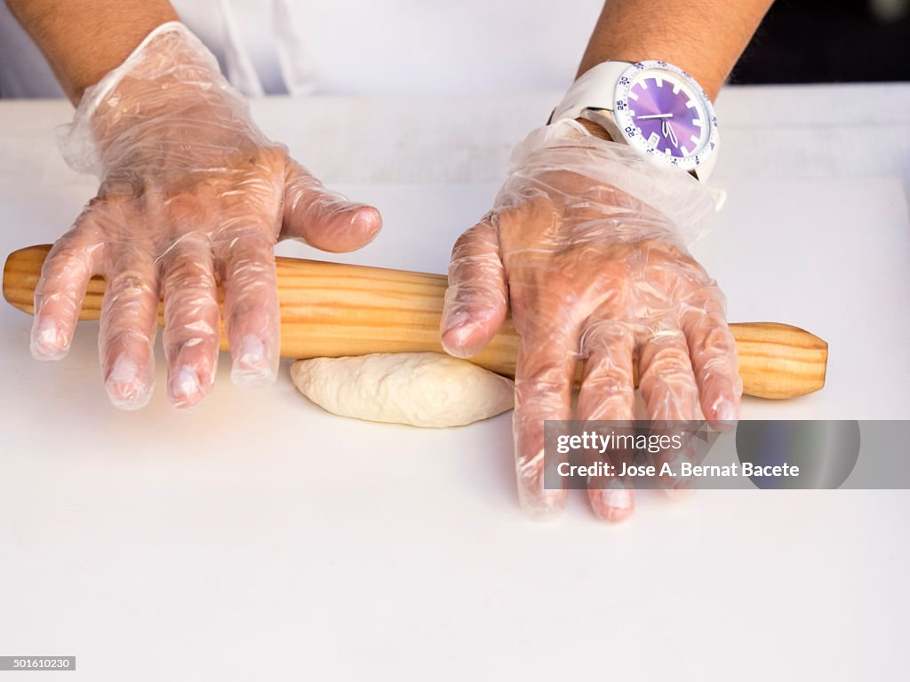 Hands of a woman kneading it grazes