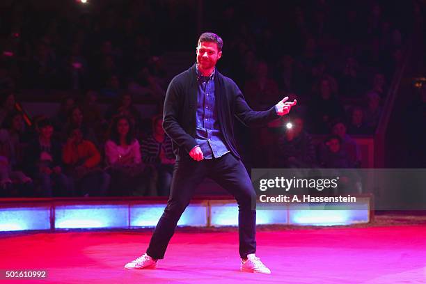 Xabi Alonso of FC Bayern Muenchen performes during the FC Bayern Muenchen Circus Gala Weihnachten 2015 at Circus Krone on December 16, 2015 in...