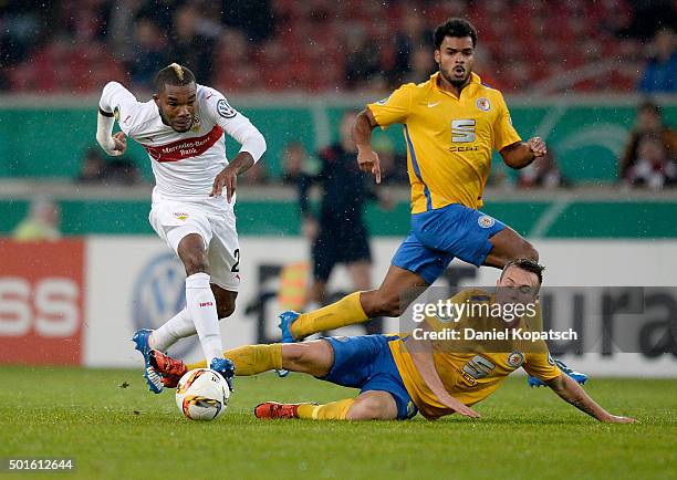 Serey Die of Stuttgart is challenged by Adam Matuschyk of Braunschweig during the round of sixteen DFB Cup match between VfB Stuttgart and Eintracht...