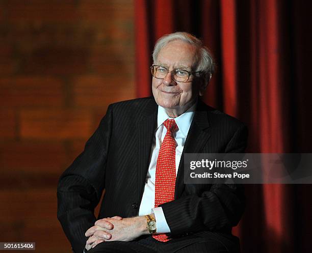 Billionaire Businessman Warren Buffett listens to Democratic Presidential Candidate Hillary Rodham Clinton at a Town Hall rally at Sokol Auditorium...