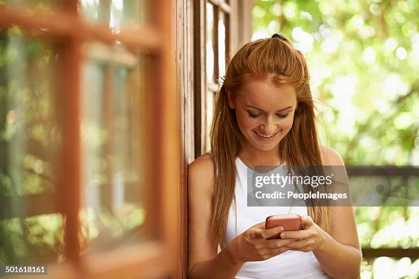 that message sure made her light up - summer camp cabin stock pictures, royalty-free photos & images