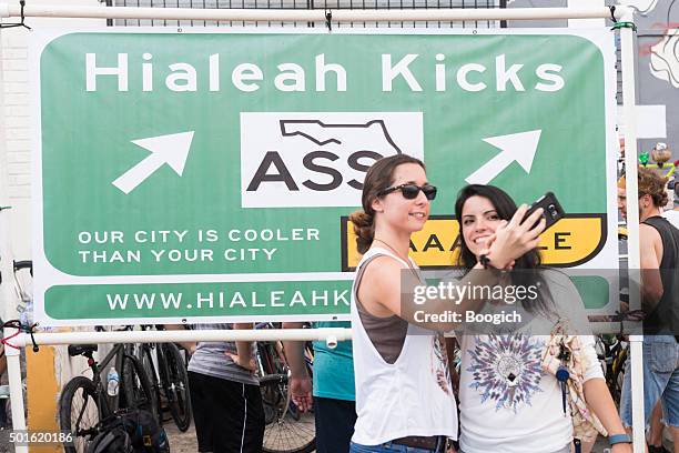 florida women take selfie at the hialeah now festival - hialeah stock pictures, royalty-free photos & images