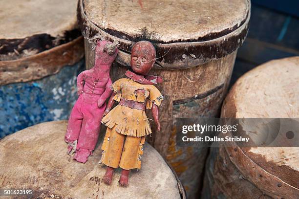 voodoo dolls and traditional ceremonial drums - voodoo doll stock pictures, royalty-free photos & images