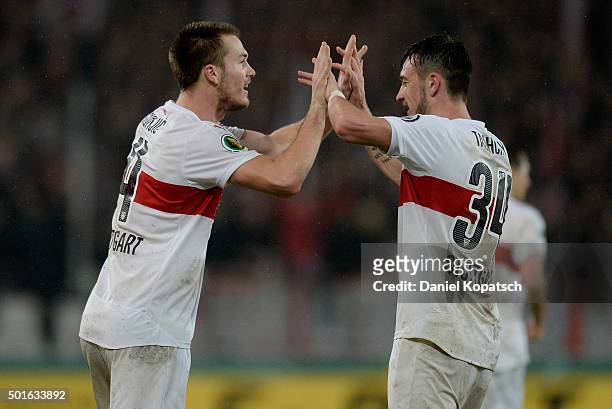 Toni Sunjic of Stuttgart celebrates his team's third goal with Borys Tashchy of Stuttgart during the round of sixteen DFB Cup match between VfB...