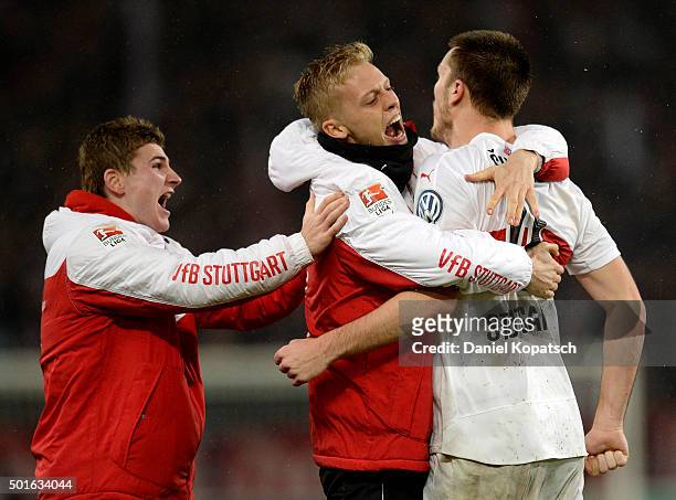 Toni Sunjic of Stuttgart celebrates his team's third goal with team mates during the round of sixteen DFB Cup match between VfB Stuttgart and...