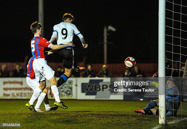 Lewis McNall of Newcastle scores the opening goal during the U18 FA Youth Cup Match between Ilkeston and Newcastle United at The New Manor Ground on...