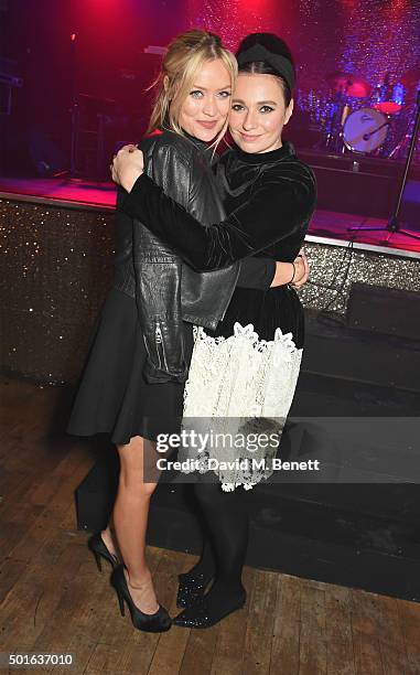 Laura Whitmore and Gizzi Erskine attend the launch of new pop-up restaurant The Glam Clam on December 16, 2015 in London, England.