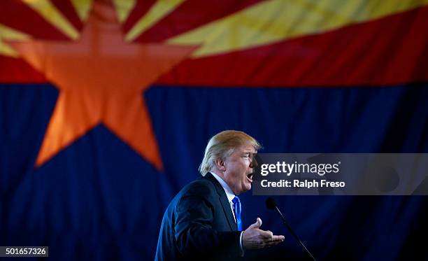Republican presidential candidate Donald Trump speaks to guest gathered during a campaign event at the International Air Response facility on...