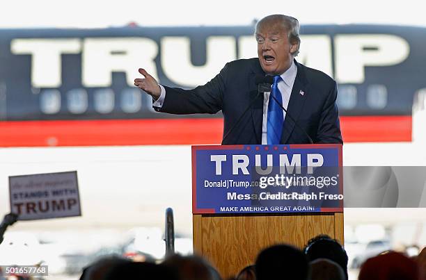 Republican presidential candidate Donald Trump speaks to guests gathered during a campaign event at the International Air Response facility on...