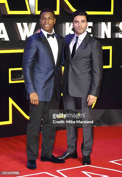 Oscar Isaac and John Boyega attend the European Premiere of "Star Wars: The Force Awakens" at Leicester Square on December 16, 2015 in London,...