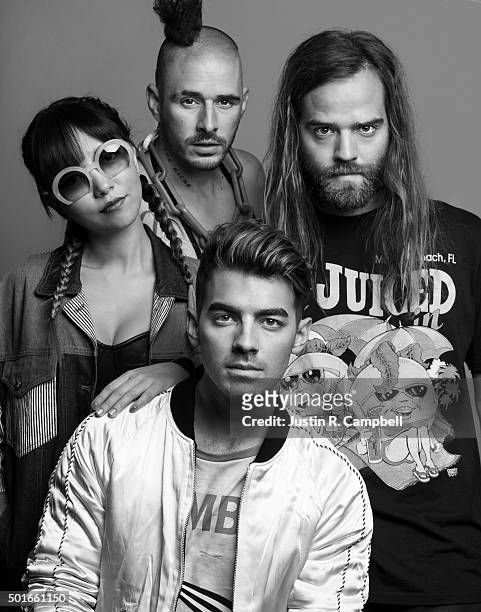Pop rock band DNCE, members Joe Jonas, Jack Lawless, Cole Whittle and JinJoo Lee, poses for a portrait at the 2015 Jingle Ball for Just Jared on...