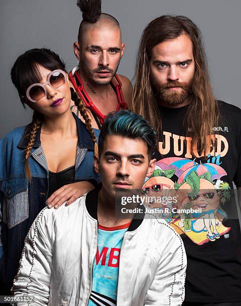 Pop rock band DNCE, members Joe Jonas, Jack Lawless, Cole Whittle and JinJoo Lee, poses for a portrait at the 2015 Jingle Ball for Just Jared on...