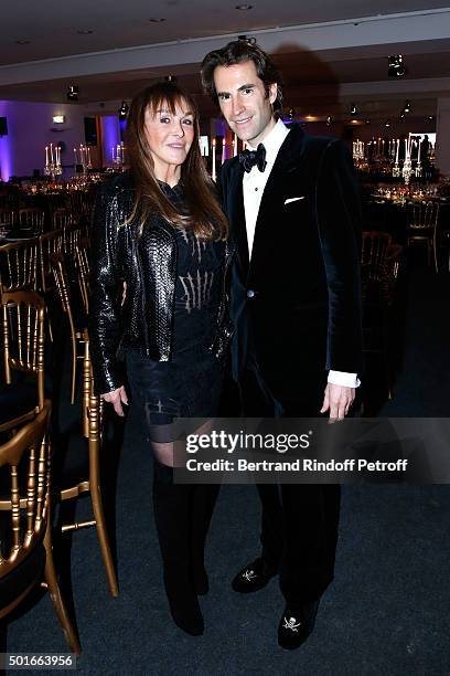 Babeth Djian and Pierre Pellegry attend the Annual Charity Dinner hosted by the AEM Association Children of the World for Rwanda. Held at Espace...