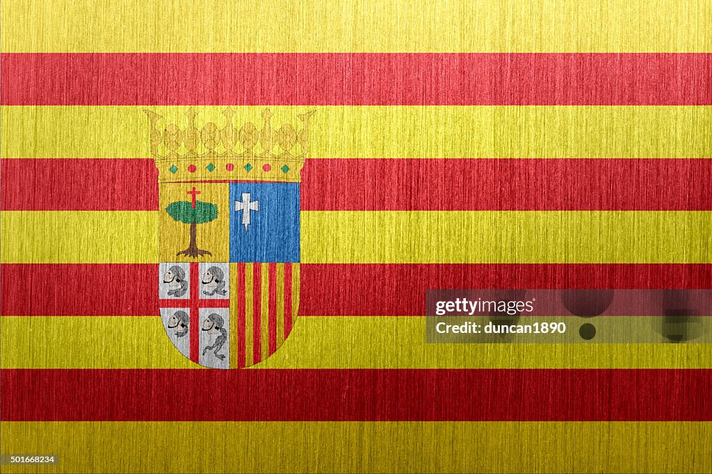 Flag of Aragon, Spain on a brushed metal background
