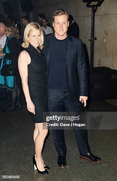 Alan Tudyk and a guest attend the European Premiere of "Star Wars: The Force Awakens" After Party at Tate Britain on December 16, 2015 in London,...