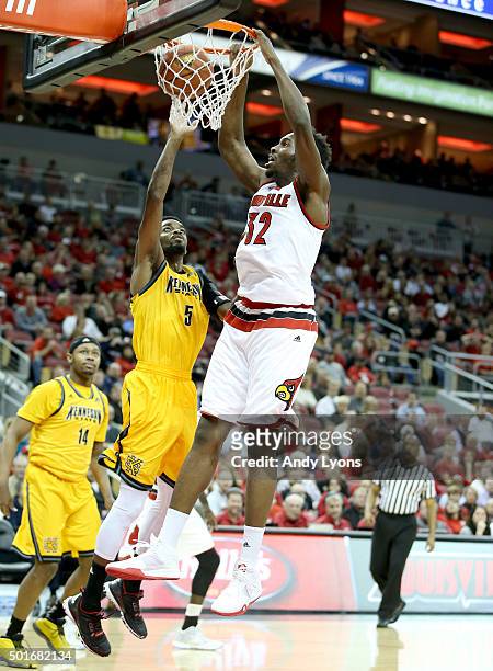 Chinanu Onuaku of the Louisville Cardinals dunks the ball during the game against the Kennesaw State Owls at KFC YUM! Center on December 16, 2015 in...