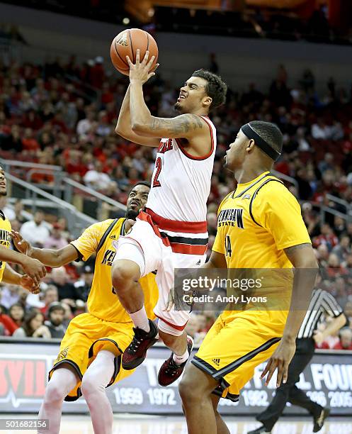 Quentin Snider of the Louisville Cardinals shoots the ball during the game against the Kennesaw State Owls at KFC YUM! Center on December 16, 2015 in...