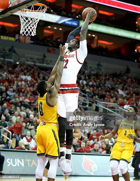 Mangok Mathiang of the Louisville Cardinals shoots the ball during the game against the Kennesaw State Owls at KFC YUM! Center on December 16, 2015...