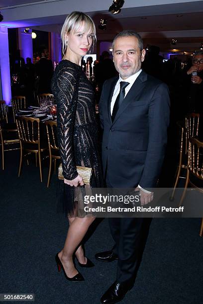 Anne-Sophie Mignaux and Fashion Designer Elie Saab attend the Annual Charity Dinner hosted by the AEM Association Children of the World for Rwanda....