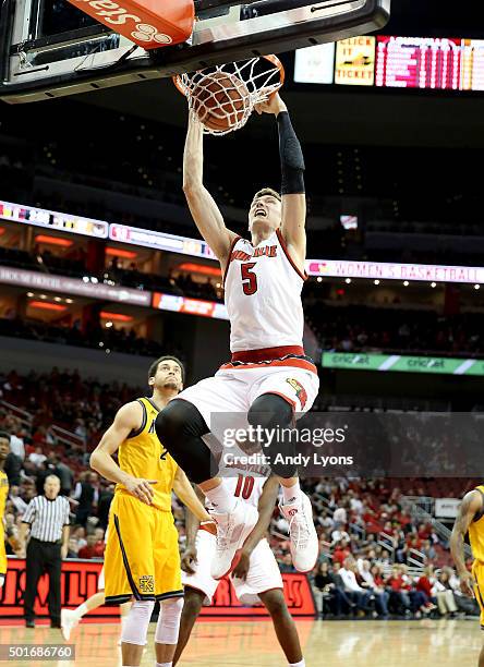 Matz Stockman of the Louisville Cardinals dunks the ball during the game against the Kennesaw State Owls at KFC YUM! Center on December 16, 2015 in...