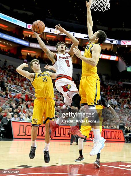 Damion Lee of the Louisville Cardinals shoots the ball during the game against the Kennesaw State Owls at KFC YUM! Center on December 16, 2015 in...