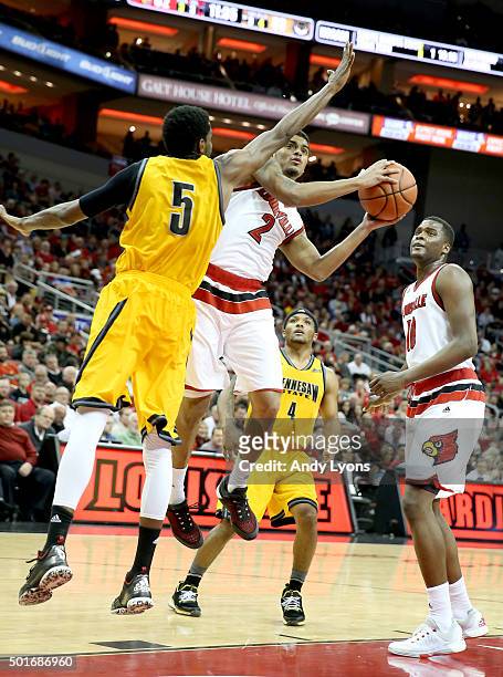 Quentin Snider of the Louisville Cardinals shoots the ball during the game against the Kennesaw State Owls at KFC YUM! Center on December 16, 2015 in...