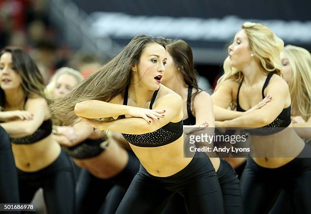 Louisville Cardinals cheerleaders perform during the game against the Kennesaw State Owls at KFC YUM! Center on December 16, 2015 in Louisville,...