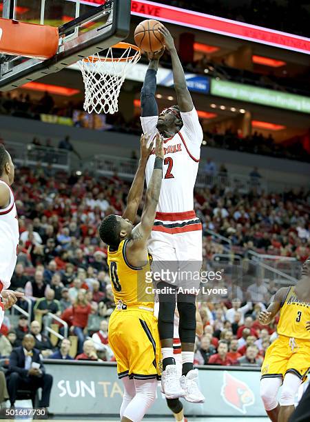 Mangok Mathiang of the Louisville Cardinals shoots the ball during the game against the Kennesaw State Owls at KFC YUM! Center on December 16, 2015...