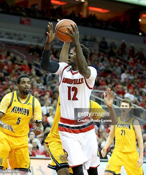 Mangok Mathiang of the Louisville Cardinals shoots the ball during the game against the Kennesaw State Owls at KFC YUM! Center on December 16, 2015...